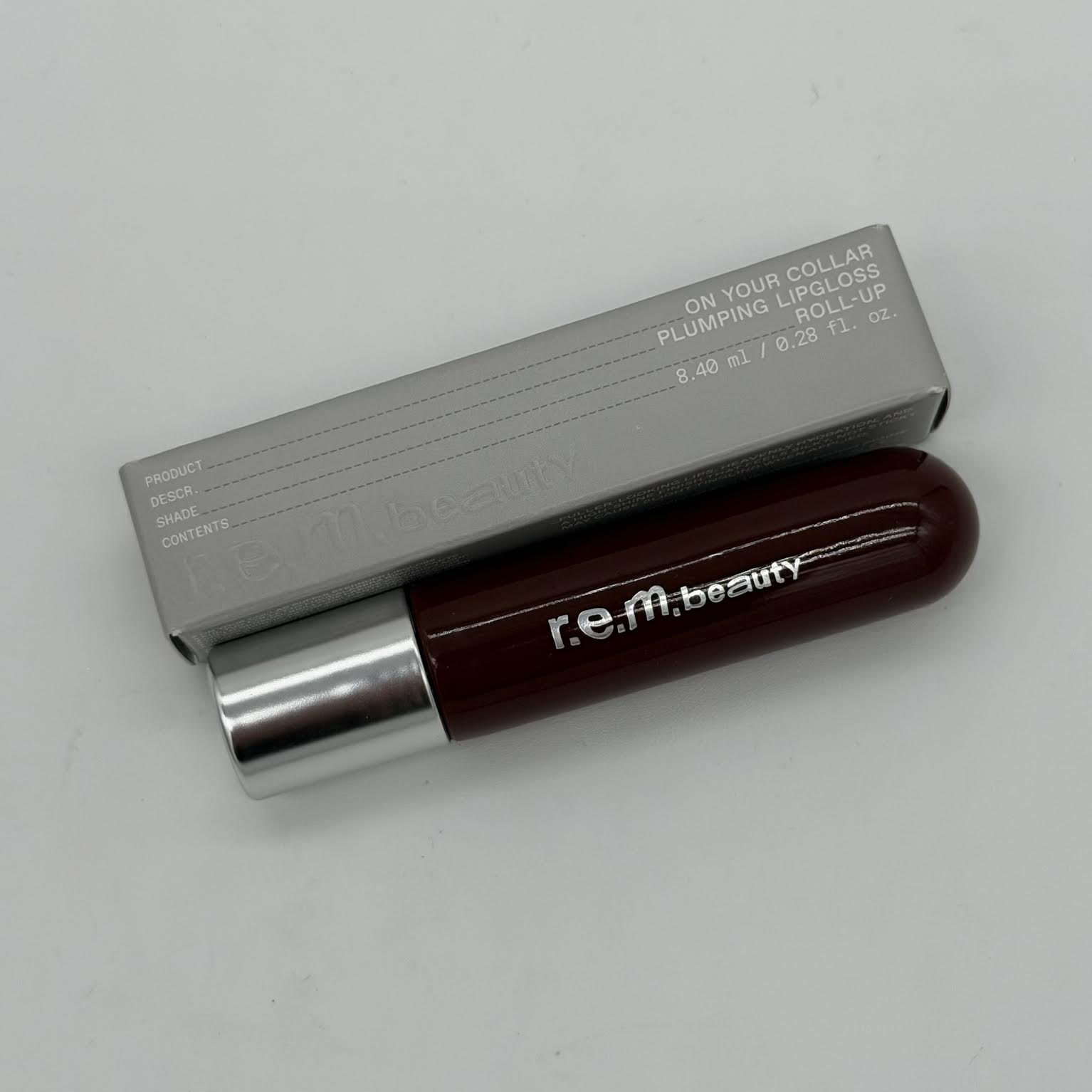 R.E.M. Beauty On Your Collar Plumping Lipgloss - Roll-Up (0.28 oz)