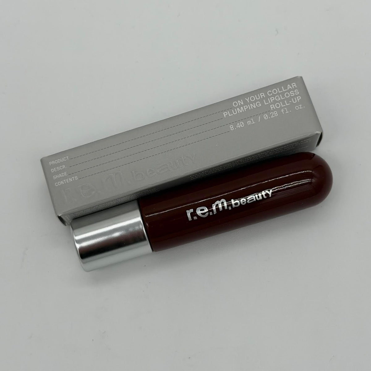 R.E.M. Beauty On Your Collar Plumping Lipgloss - Roll-Up (0.28 oz)